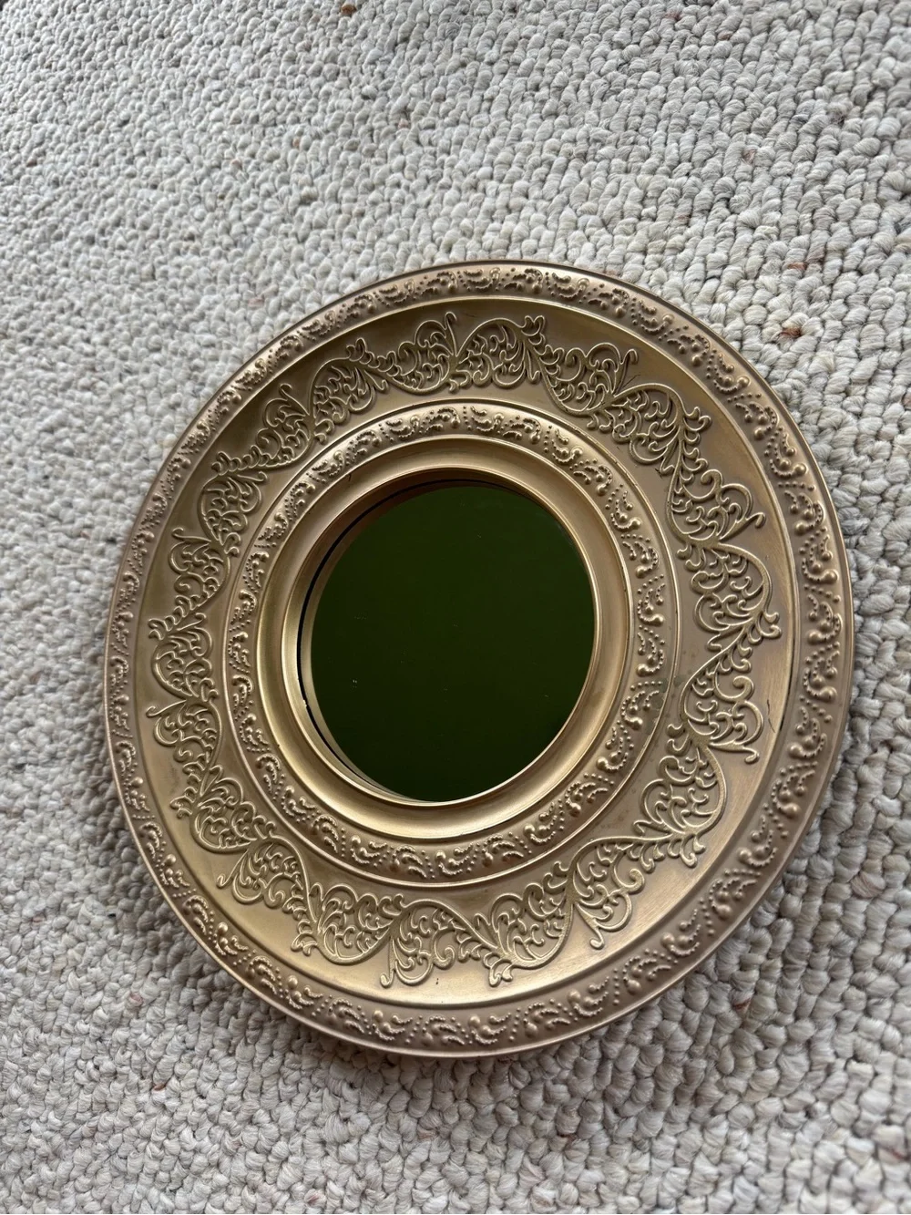 Plastic antique finish champagne colored VON CASA wall mirror